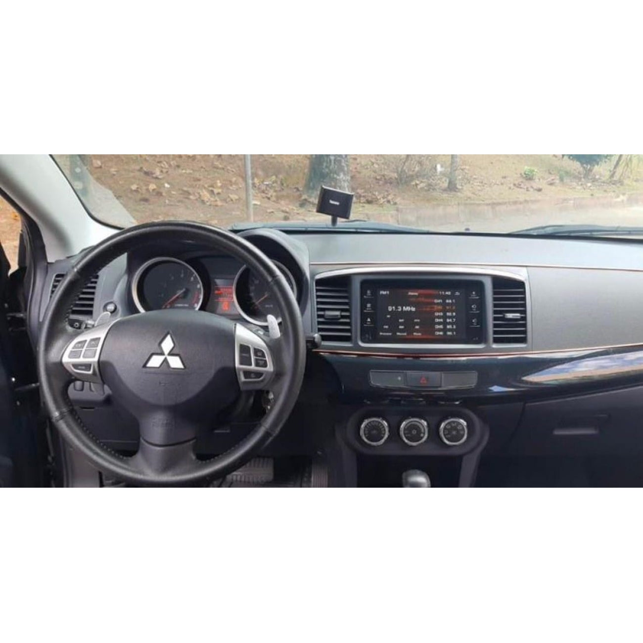 MOLDURA 10.1 MITSUBISHI LANCER 2008-2015 PRETO