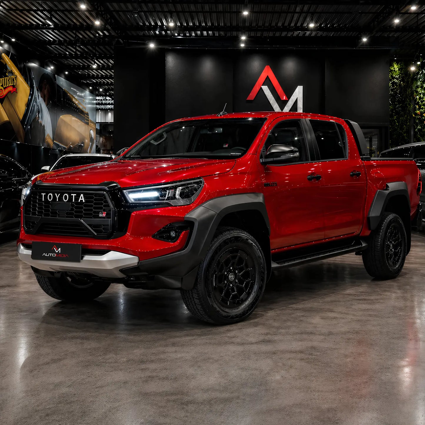 Toyota Hilux GR Sport 2024 vermelha transformada em vista frontal e lateral, com grade Toyota, Body Kit, alargadores de para-lama, faróis LED e rodas pretas.